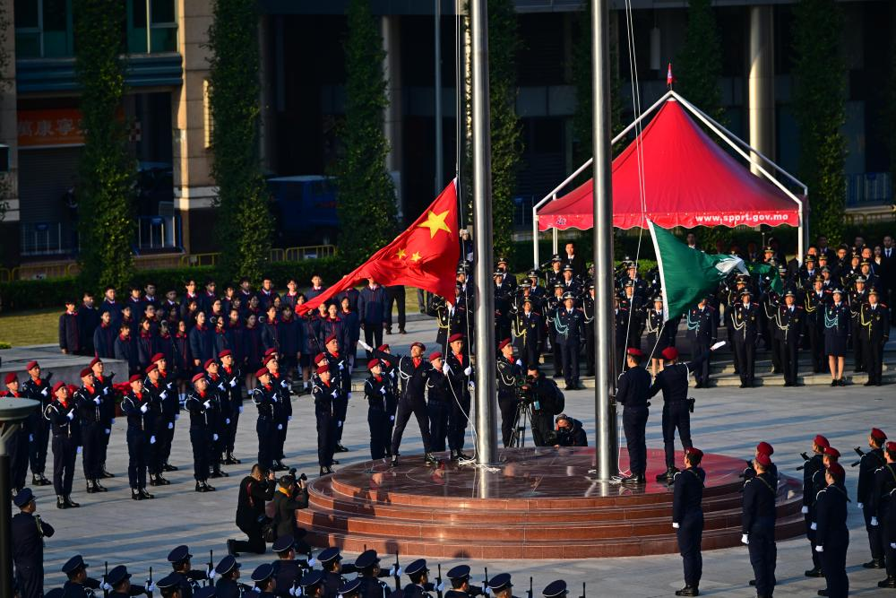 12月20日，澳門特別行政區(qū)政府隆重舉行升旗儀式，慶祝澳門回歸祖國25周年。　